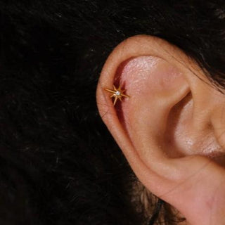 Piercing 1era Perforación Destello Titanio