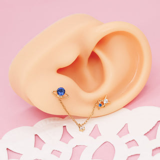 Piercing Dúo Universe con Cadena Titanio