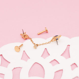 Piercing Dúo Universe con Cadena Titanio