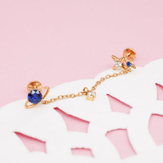Piercing Dúo Universe con Cadena Titanio