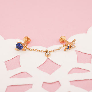 Piercing Dúo Universe con Cadena Titanio